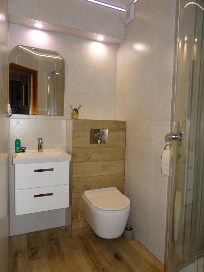 Olimp Pokoje I Apartamenty ชเจอร์ค ภายนอก รูปภาพ