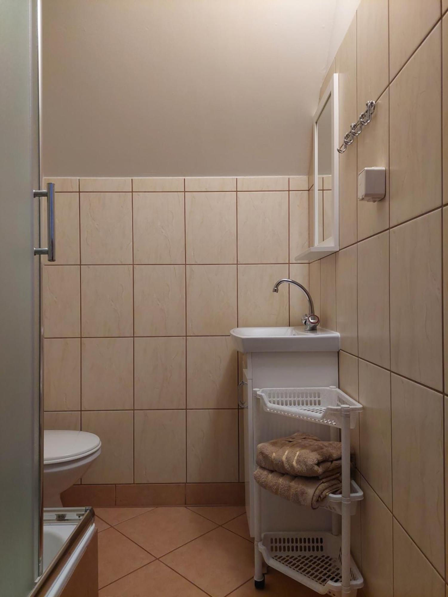 Olimp Pokoje I Apartamenty ชเจอร์ค ภายนอก รูปภาพ